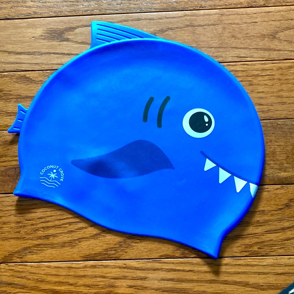NEW shark swim cap. Measurements 8.5 inches x 7 inches.